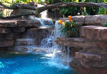 Landscape design and landscape designers featuring a custom waterfall in Key Biscayne, FL